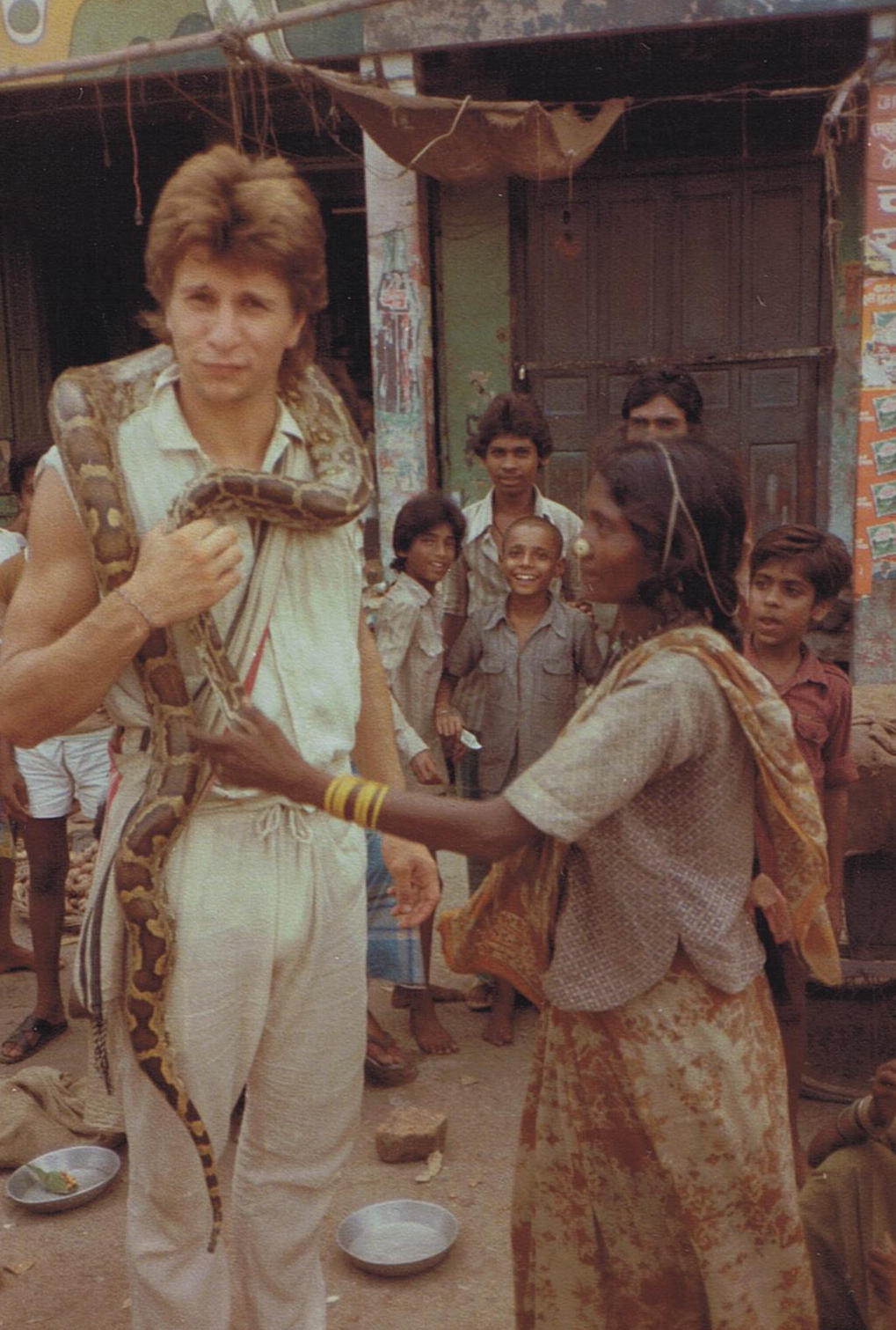 Chris with snake charmer - Varanasi, India - 1984